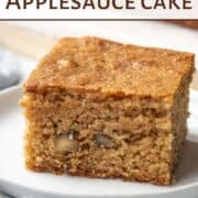 slice of applesauce cake on a white plate.