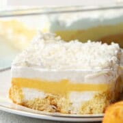 slice of twinkie cake on a white plate.