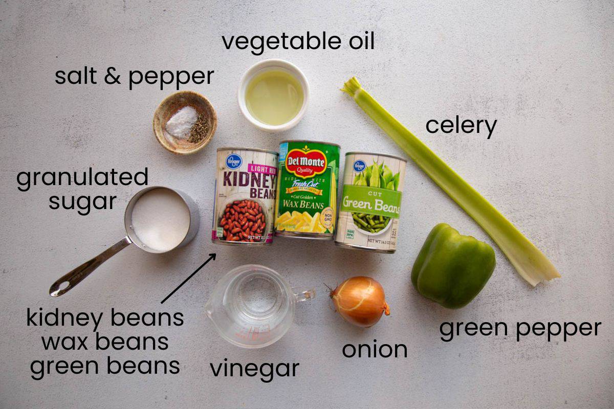 ingredients needed to make marinated three bean salad with text labels.