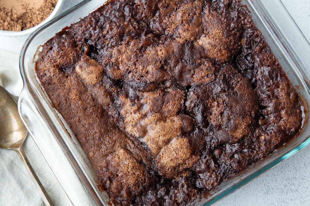 chocolate pudding cake in a glass dish.