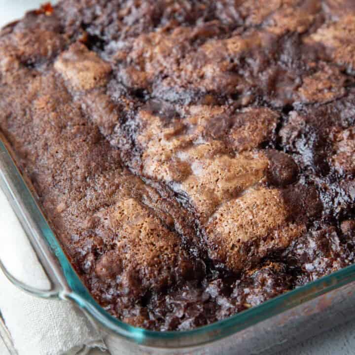 hot fudge pudding cake in a glass pan.