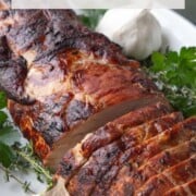 sliced pork roast on a platter.