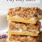 pay day cookie bars on a wooden board.