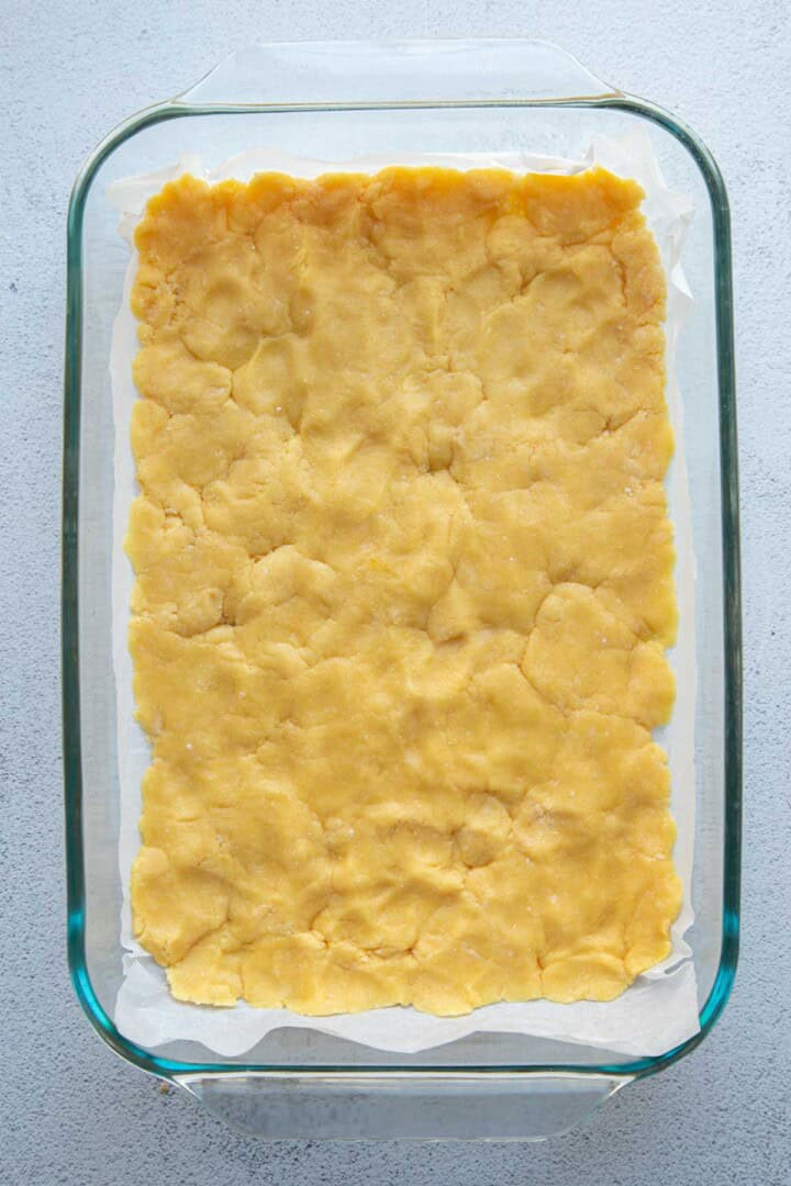 cake mix mixture pressed into a glass dish.