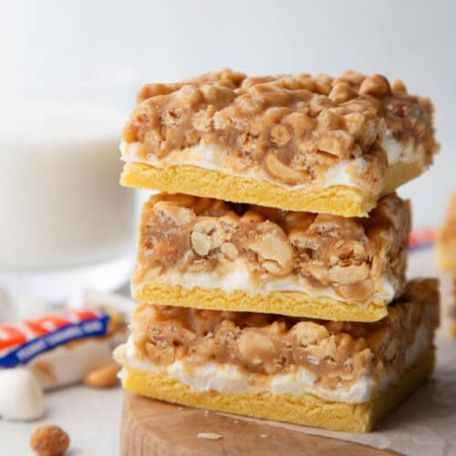 pay day bars stacked on a wooden board.