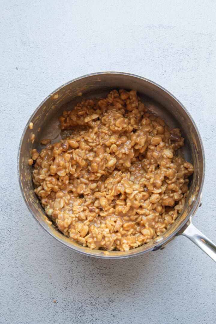 peanut butter mixture with peanuts and rice krispies.