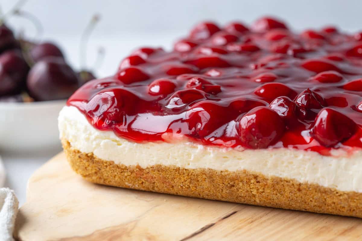 side view of an entire pan of cherry delight.