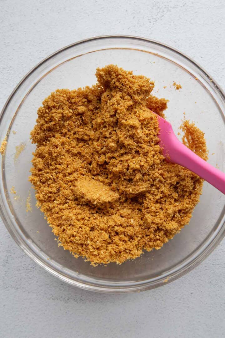 graham cracker crumbs in a glass bowl.