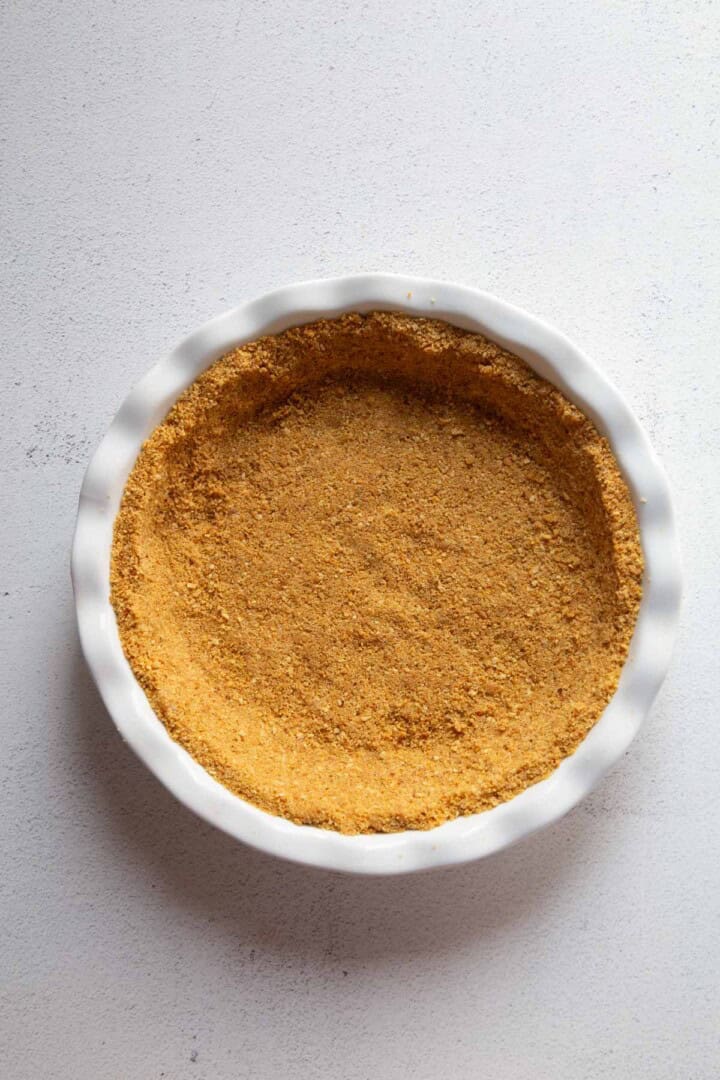 graham cracker crust in a pie dish.