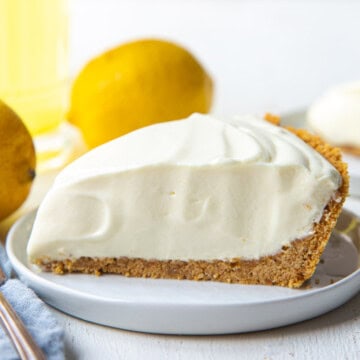 slice of lemonade pie with graham cracker crust.