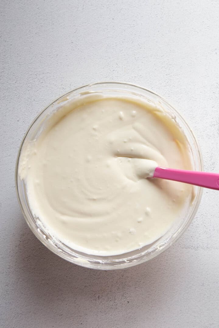 whipped topping mixture in a glass bowl.