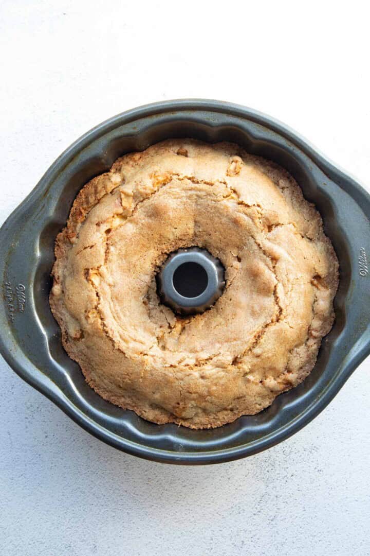 baked apple bundt cake in the pan.