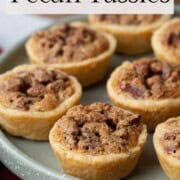 pecan tassies on a green pedestal platter.