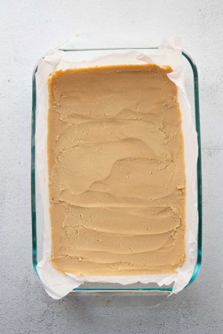 cookie dough patted into a 13x9-inch pan.