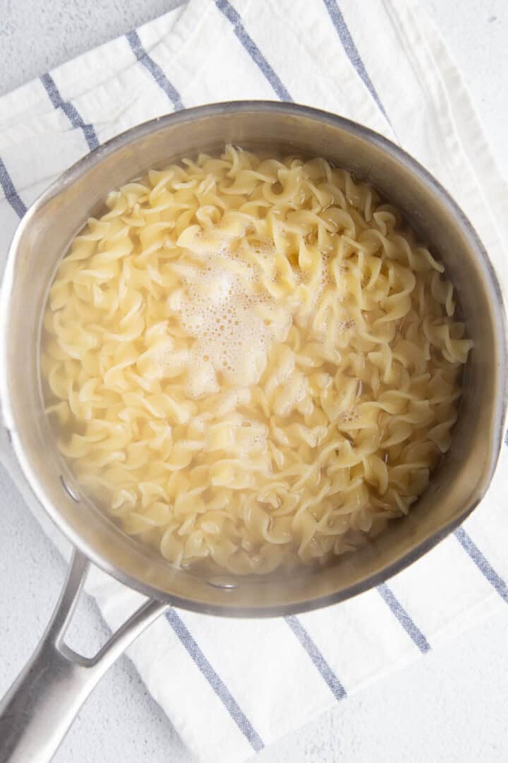 boiled egg noodles in a saucepan.
