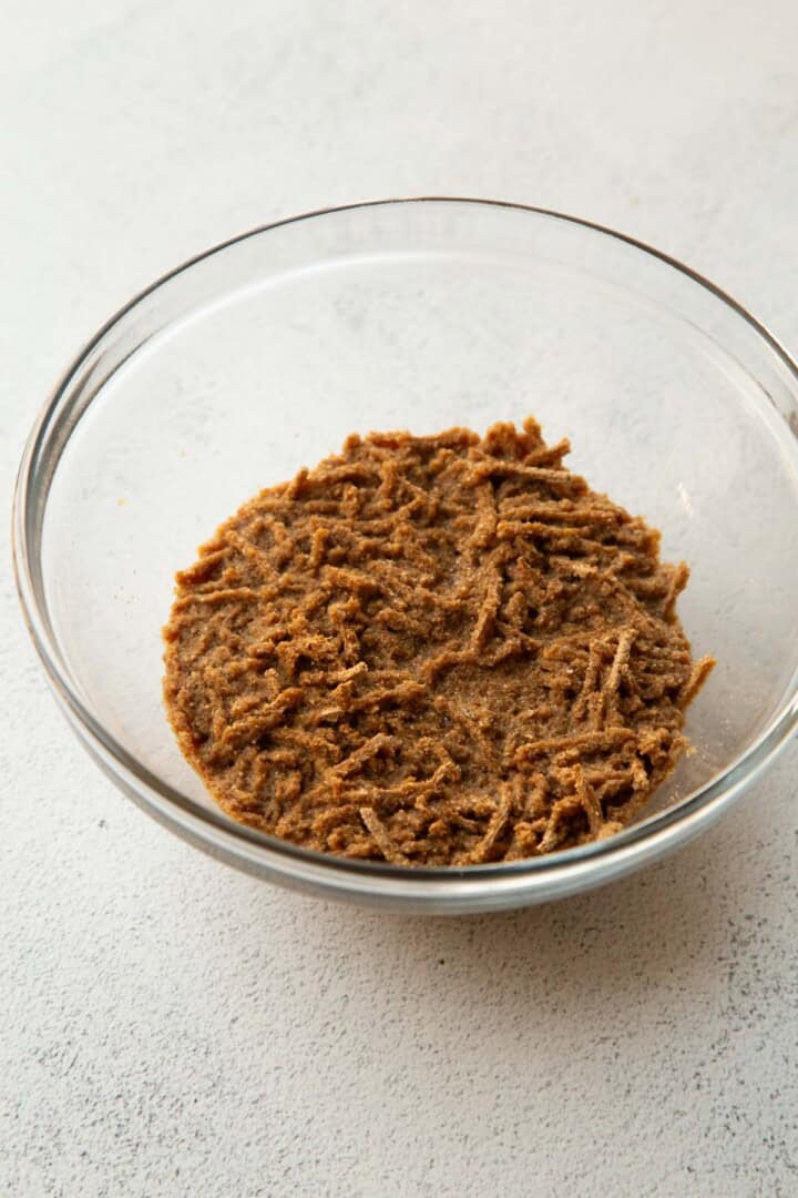 all bran soaking in water in a bowl.