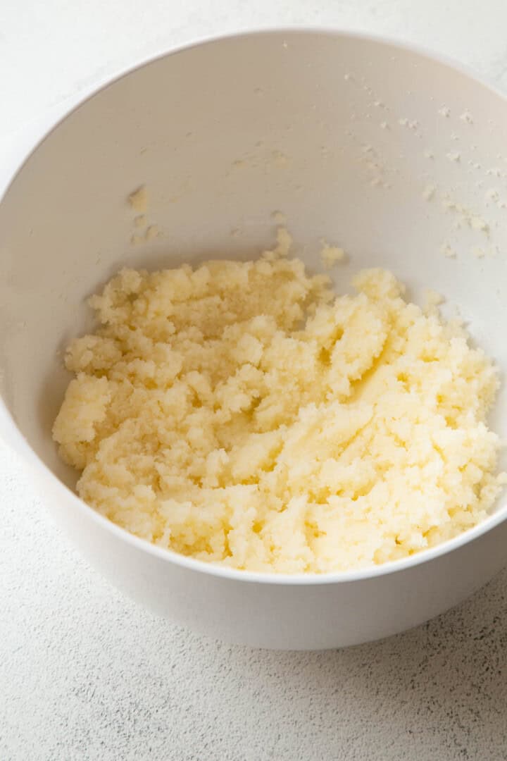 butter and sugar creamed together in a bowl.