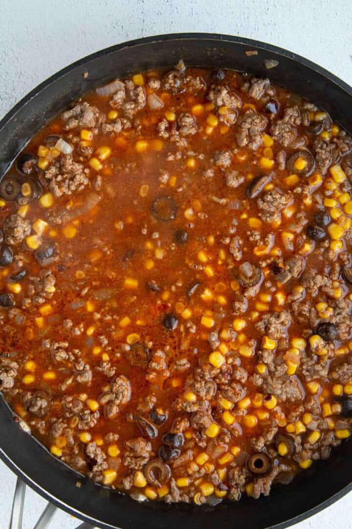 tomato and corn mixture in a skillet.