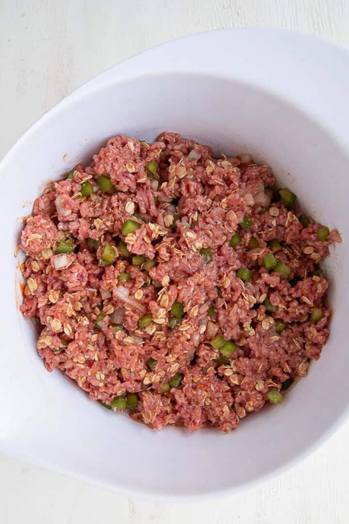 meatloaf mixture in a white bowl.