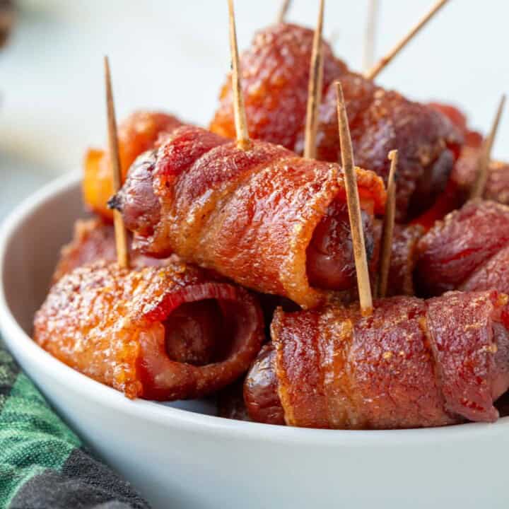 bacon wrapped smokies with toothpicks.