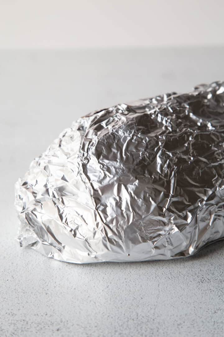 loaf of bread wrapped in foil.