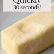 stick of butter with a fingerprint indentation.