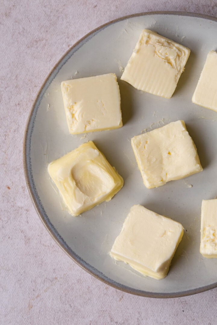 softened butter cut into tablespoons.
