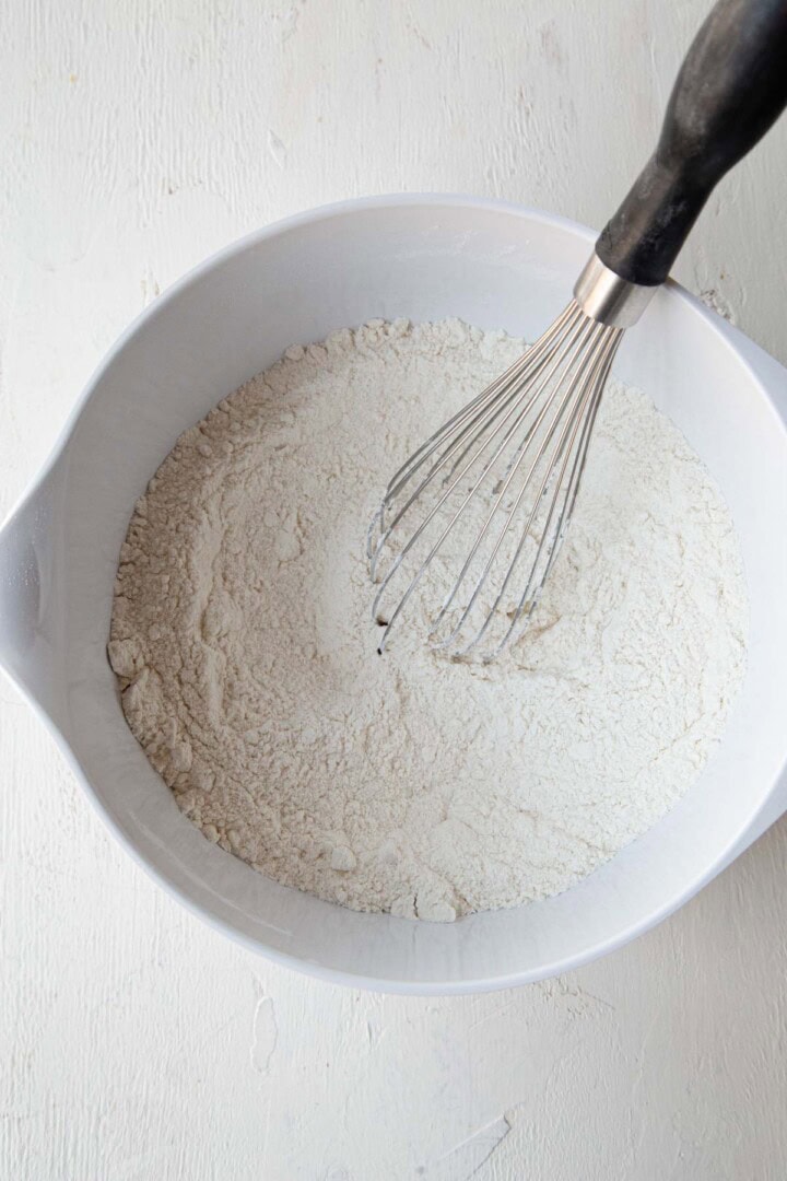 flour mixture in a bowl with a whisk.