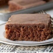 slice of chocolate sheet cake with a thin layer of chocolate frosting on a white plate.
