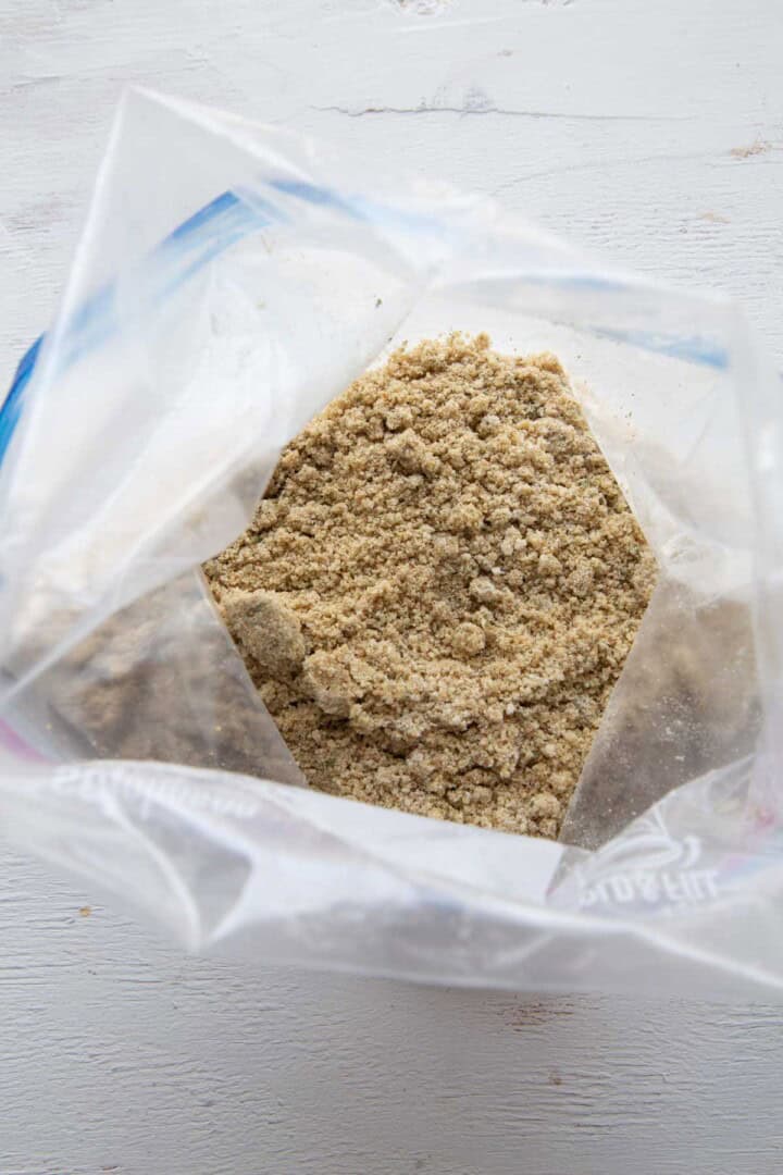 breadcrumbs and seasoning in a plastic bag.
