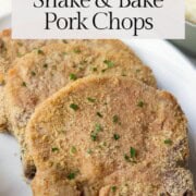 shake and bake pork chops on a white platter.