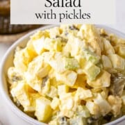 egg salad with pickles in a bowl.