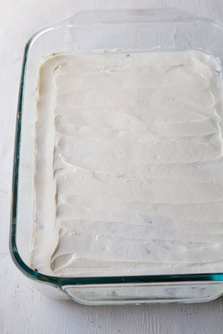 cream cheese mixture in a baking dish.