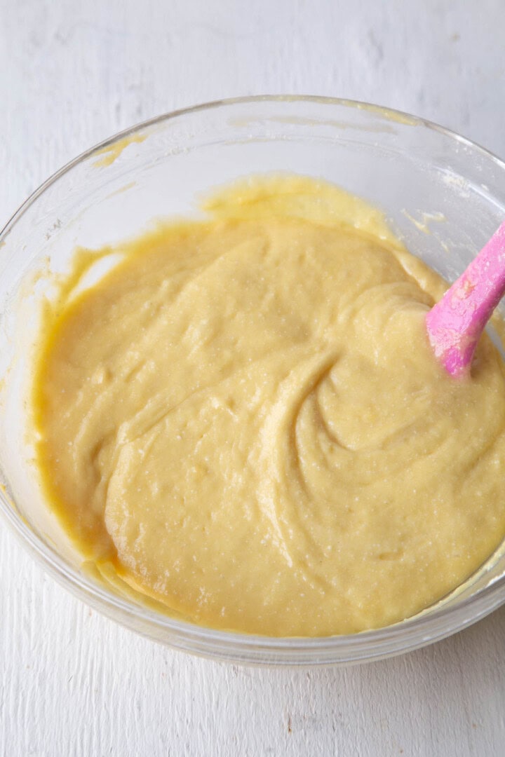 yellow cake batter in a glass bowl.