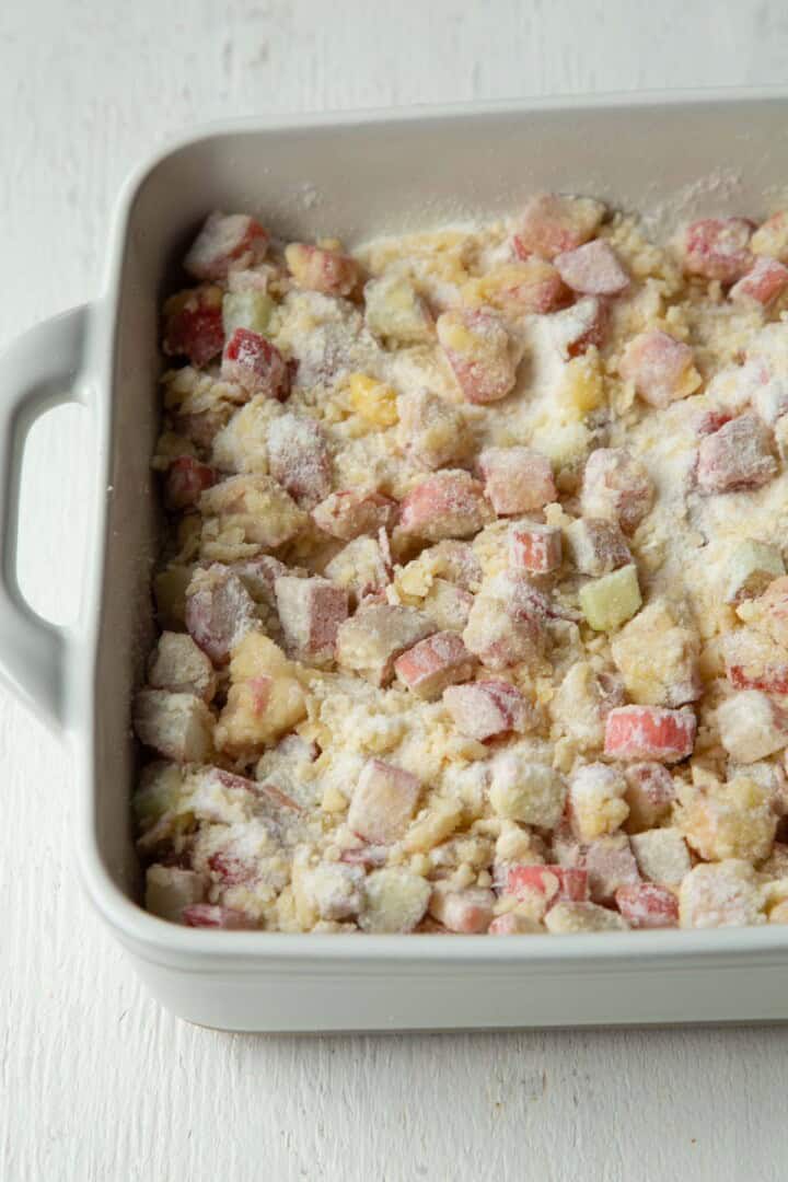 sugar and flour coated rhubarb in a baking dish.