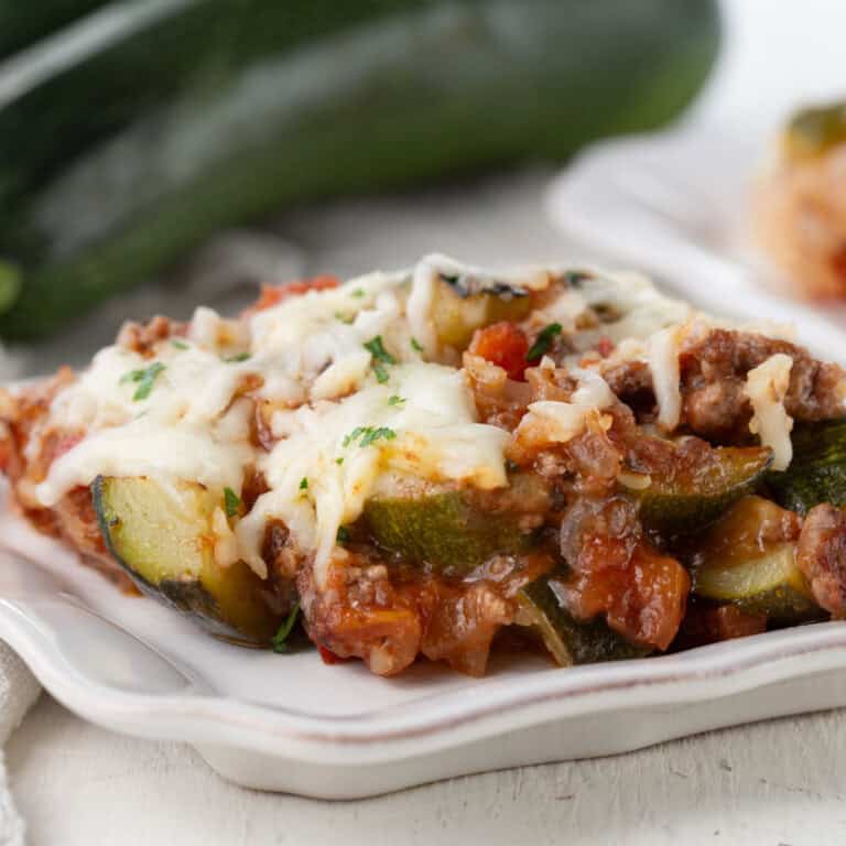 ground beef, zucchini, and tomatoes topped with shredded cheese.