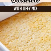 corn casserole in a white casserole dish.