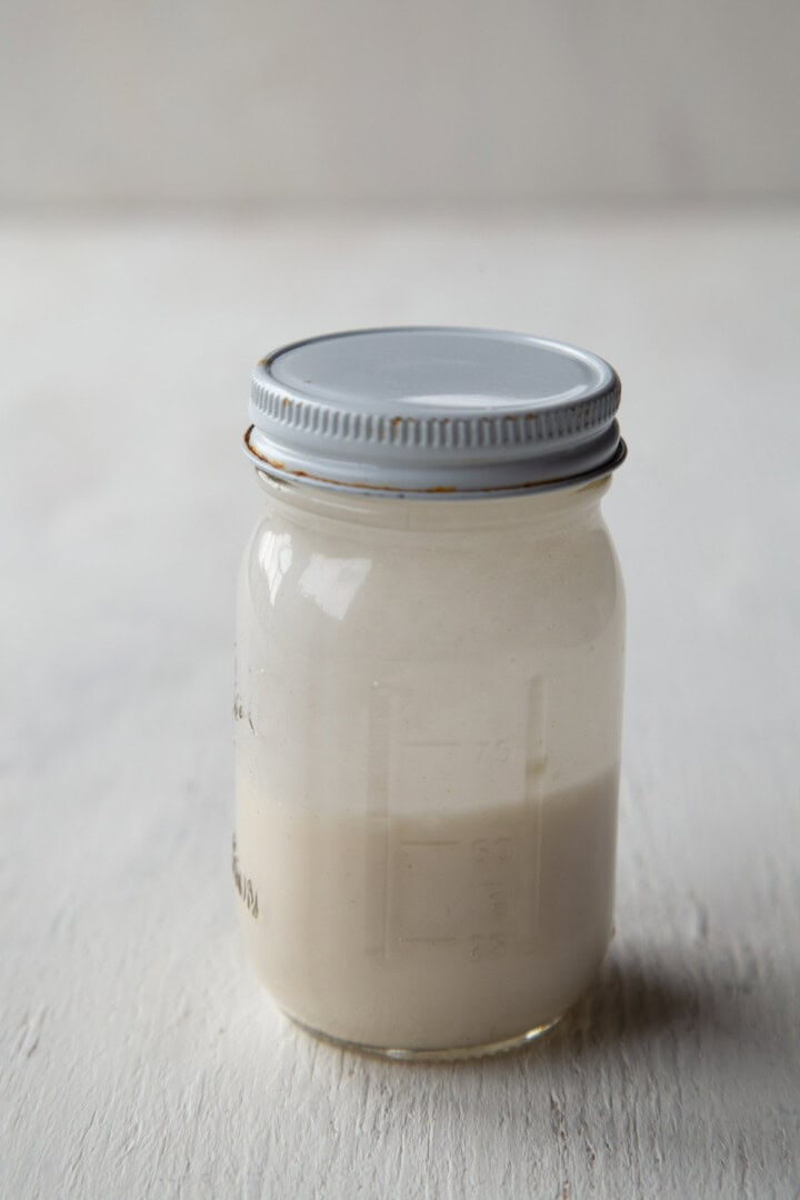 flour and water shaken together in a jar with a lid.