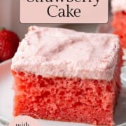 slice of strawberry cake with pink strawberry frosting.
