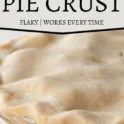 unbaked pie crust in a glass pie dish.