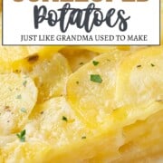 layers of sliced potatoes in a casserole dish.