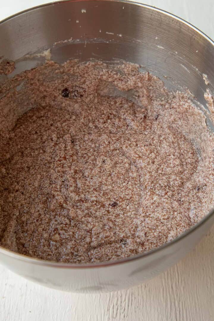 blackberry jam and butter mixture in a metal bowl.