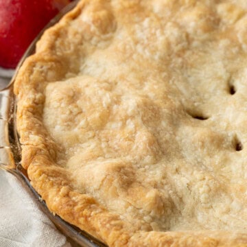 top of a pie crust with a crimped edge.
