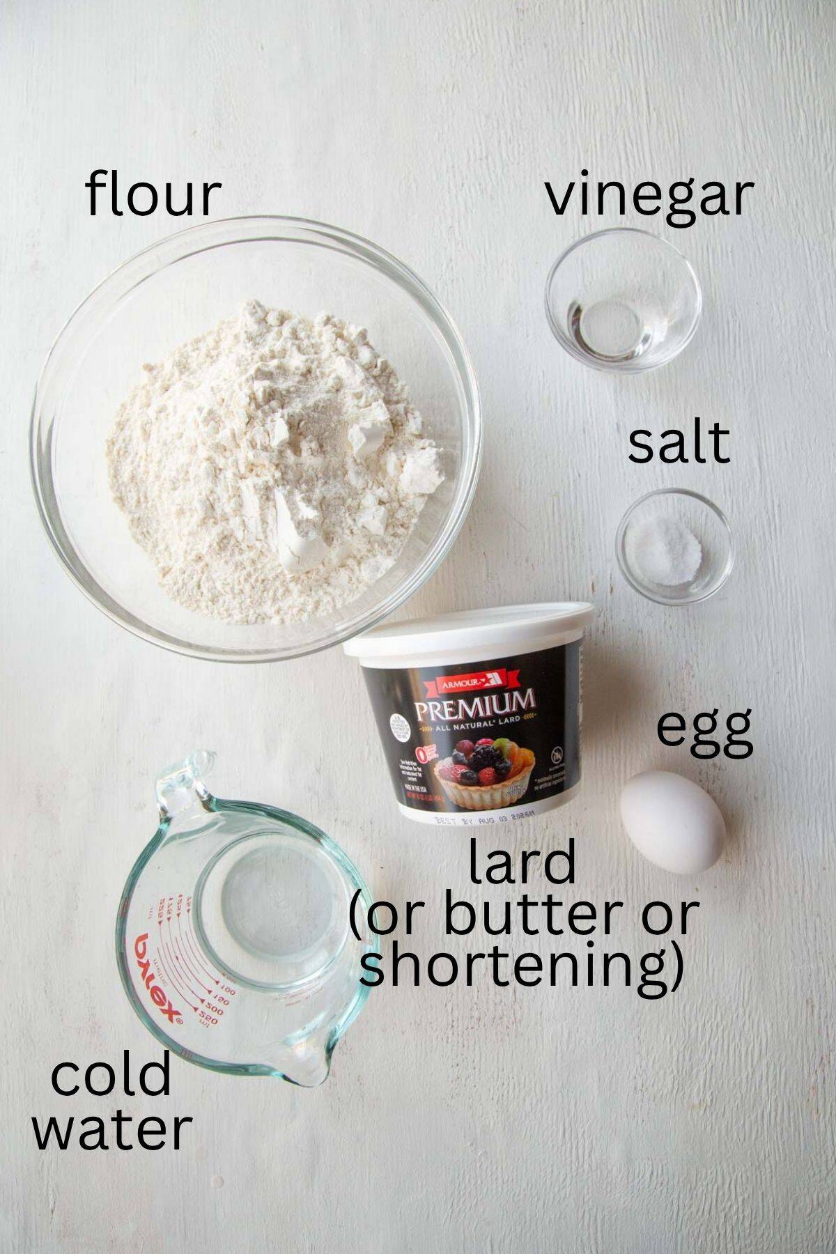 flour, egg, vinegar, lard, water, and salt.