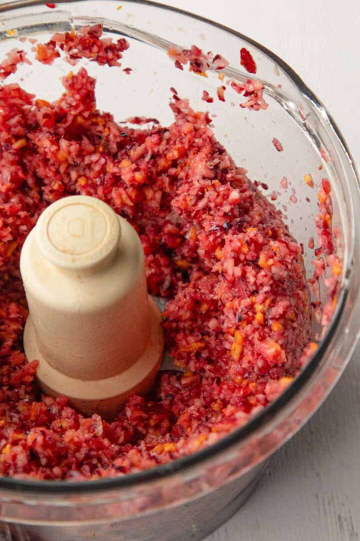 finely chopped cranberries, oranges, and apples.