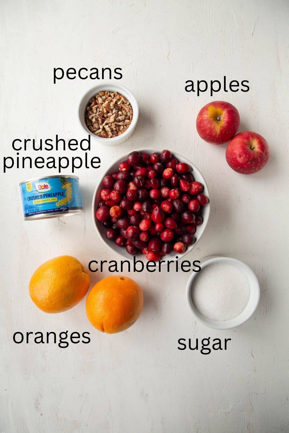 cranberries, oranges, apples, sugar, and other ingredients.