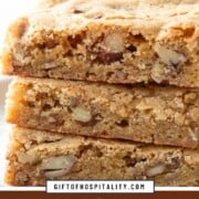 stack of blondies with pecans inside.