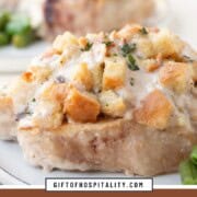 pork chop topped with stuffing and cream of mushroom soup.