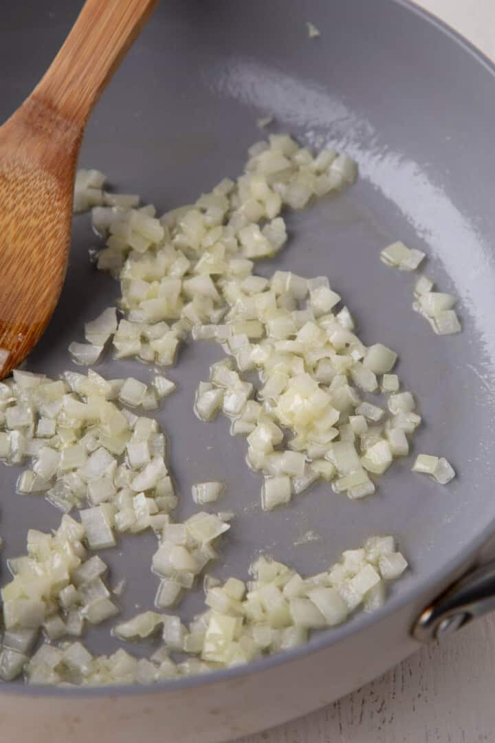 sautéed onions in a skillet.