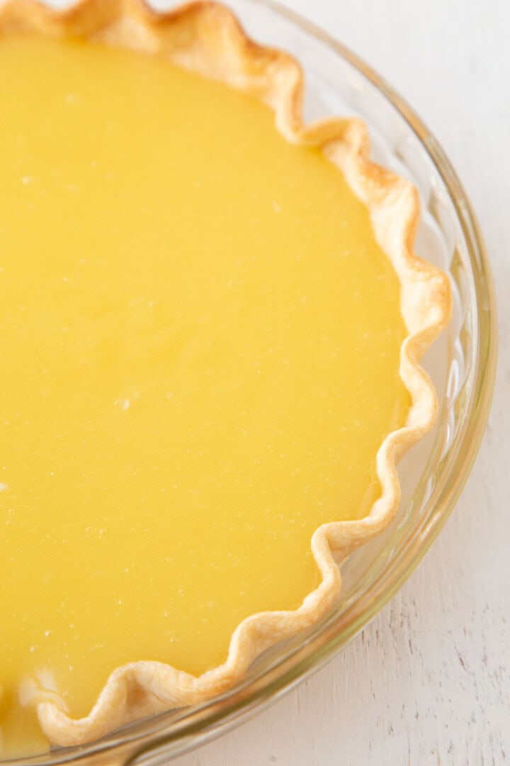 yellow lemon filling in a pie shell.